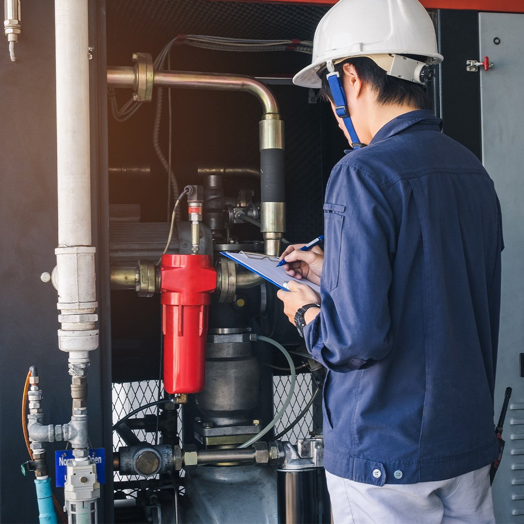 engineer-doing-quality-check-of-industrial-HVAC-unit