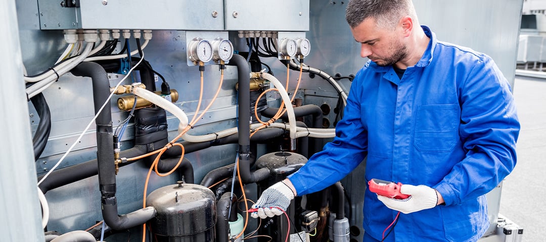 engineer-performing-leak-test-on-HVAC-equipment-RECTANGLE