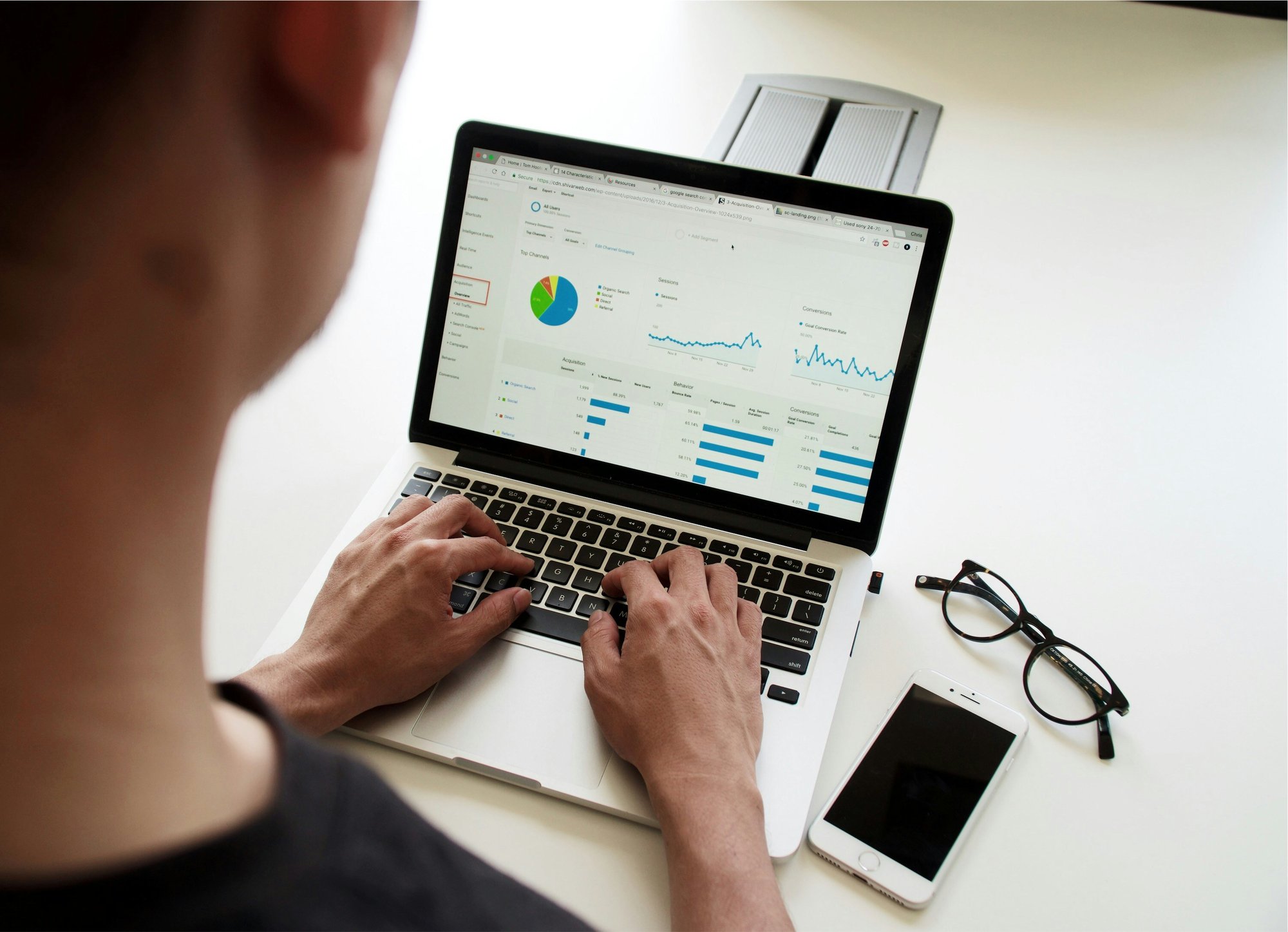 person budgeting on computer